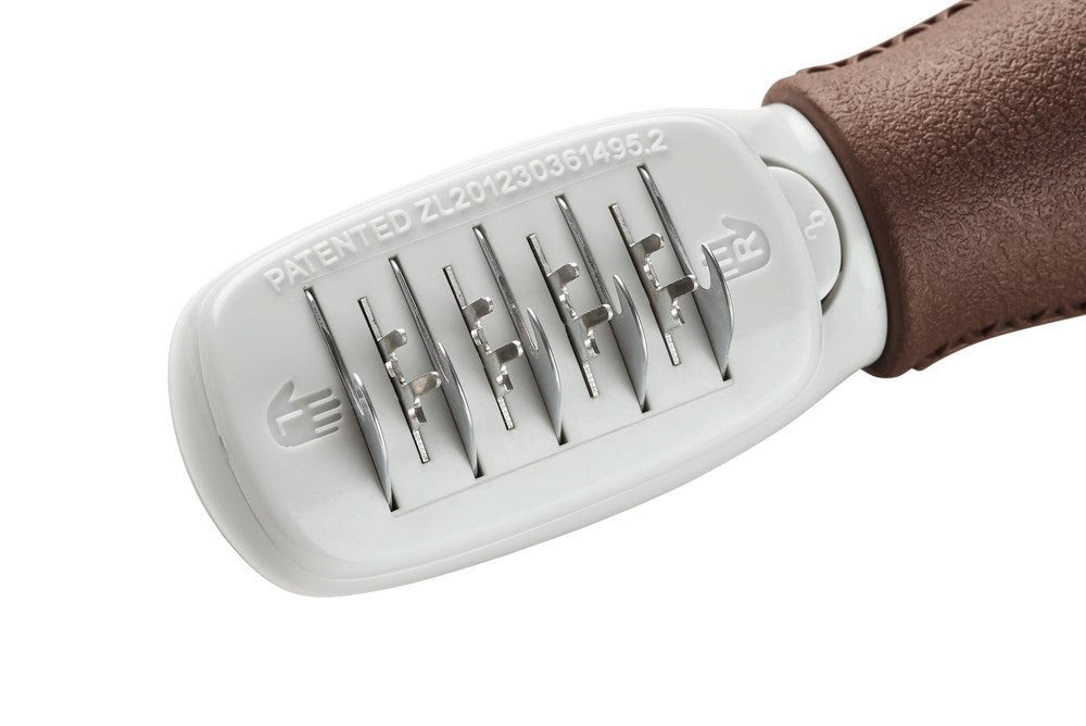 De-Felting knife SPA - Hunter-petstore -suitable for dogs with medium-length and long hair -rotatable head -removes matted tangles from the undercoat -smooths top coat -high-quality stainless steel safety blades prevent injuries -ergonomic handle with a high-quality leather look