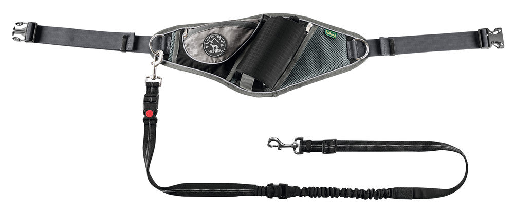 JASPER Jogging belt - Hunter-petstore -ergonomic bag for sporting activities with the dog -individually adjustable to your own waist circumference (up to 3'11¼­˝ ) -with elastic, infinitely adjustable lead (up to 3'10 1⁄16˝, without pull) -with safety buckle and wrist loop with soft neoprene padding -with slide-in and zipped pockets for keys, water bottle and co. -reflective elements for optimum visibility -easy to clean: simply wash off